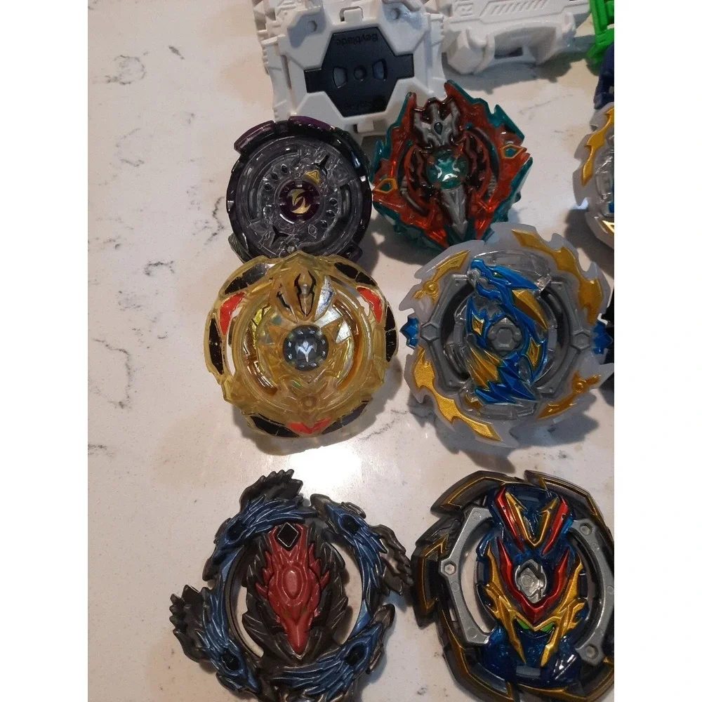 Lot Of 8 Beyblade And Different Parts